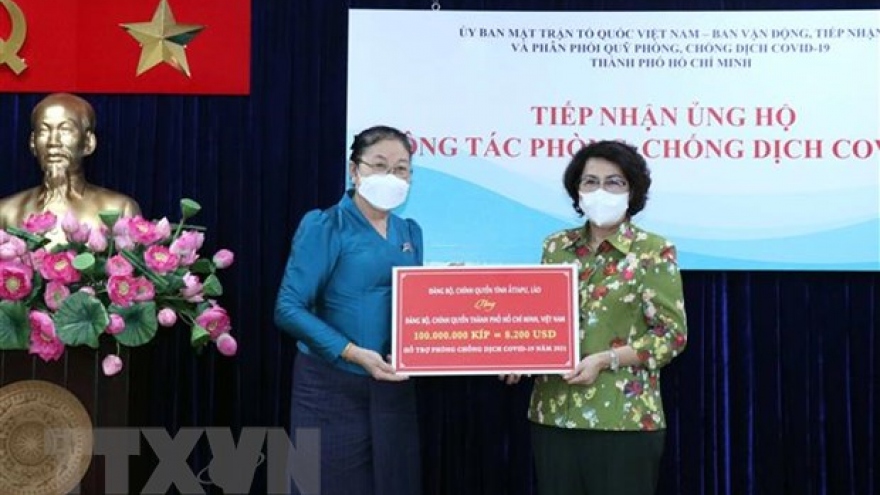 Laos donates aid to HCM City’s COVID-19 fight